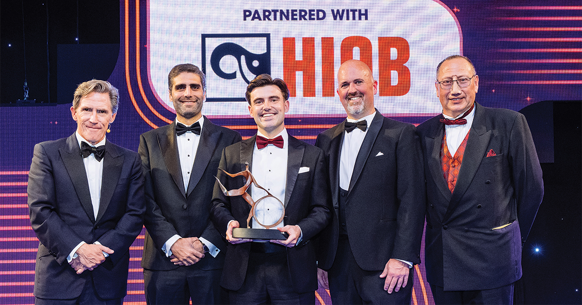 Sam Collett collecting Team of the Year award at Motor Transport 2025 Awards