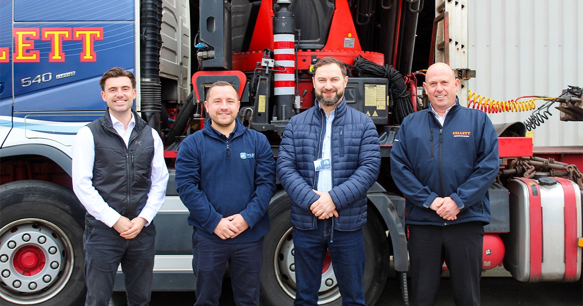 Collett Director, Sam Collett and Sales Director, Mick Harland, alongside Wilson Power Solutions’ Head of Operations, Jake Young, and Marketing Manager, Marek Skibinski standing infront of a crane vehicle at Sherburn warehouse