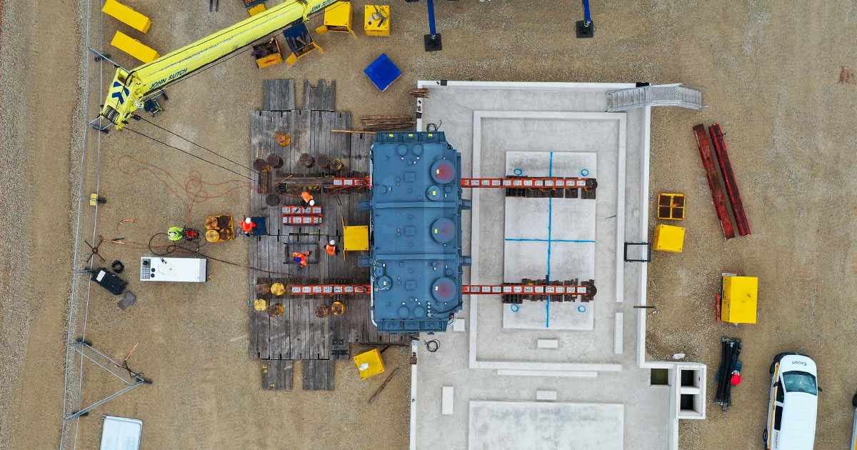 Yorkshire Green O4 Aerial view of a Super Grid Transformer skidding across the bund at Monk Fryston Substation