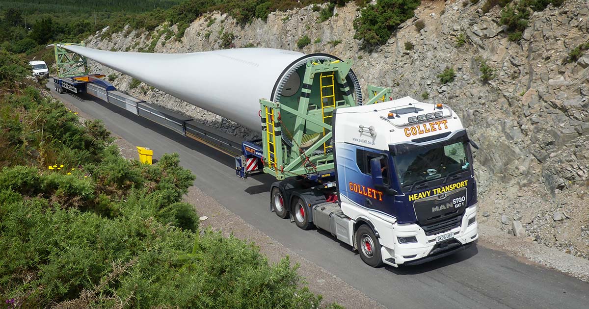 Collett transporting a wind turbine tower section along a restricted Highland route